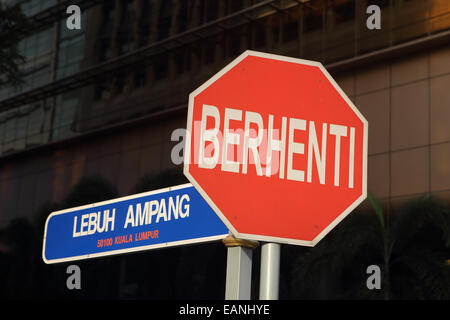 Street and Malaysian stop sign in Kuala Lumpur Stock Photo