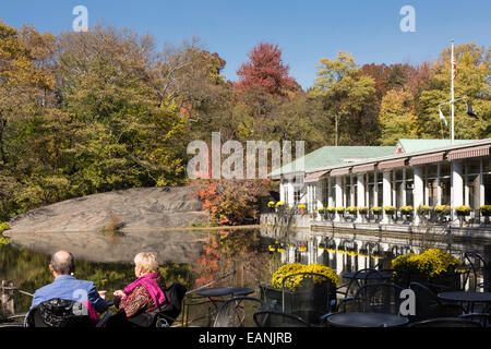 Senior Couple On Deck Outside Loeb Boathouse Restaurant in Central Park, NYC Stock Photo