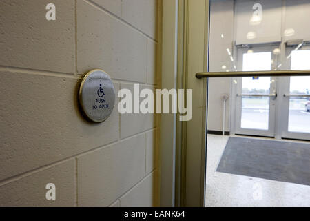 push to open disability access door operation button Saskatchewan Canada Stock Photo