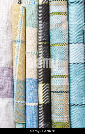 Blue and cream tartan fabric rolls Stock Photo