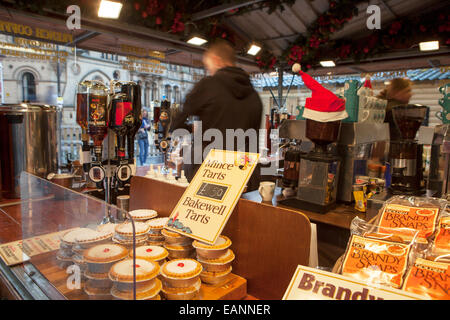 December Traditional Festive Dickensian Christmas Festival Street Market Stalls in  Albert Square, Manchester, UK Stock Photo