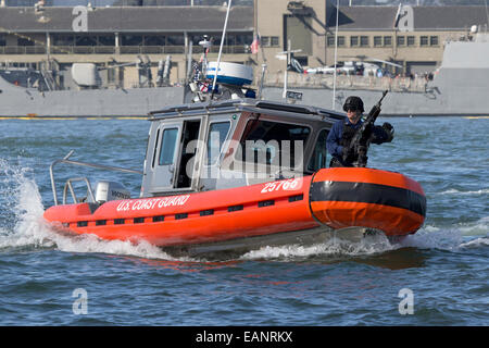 Coast Guard MSST Team in a Defender Class Response Boat patrols the San Francisco waterfront. Stock Photo