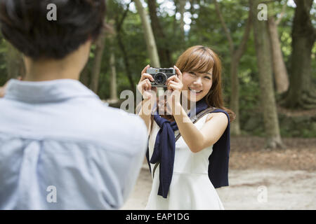 A couple, a man and woman in a Kyoto park. Stock Photo