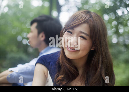 A couple, a man and woman in a Kyoto park. Stock Photo