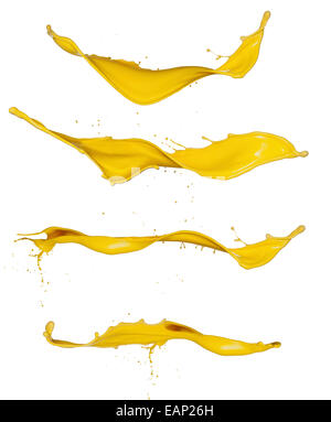 Shot of yellow paint splashes, isolated on white background Stock Photo