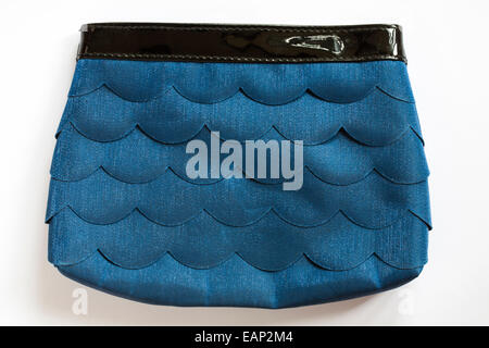 blue clutch bag handbag with black edging on white background Stock Photo