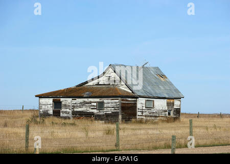 abandoned old wooden farmhouse traditional on farm in rural Canada Stock Photo
