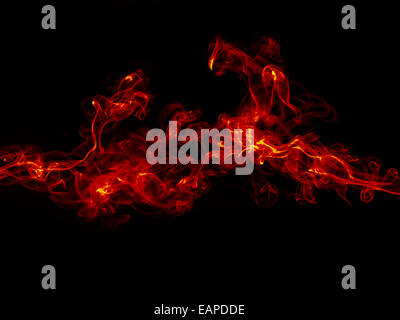 Orange smoke isolated on black background Stock Photo