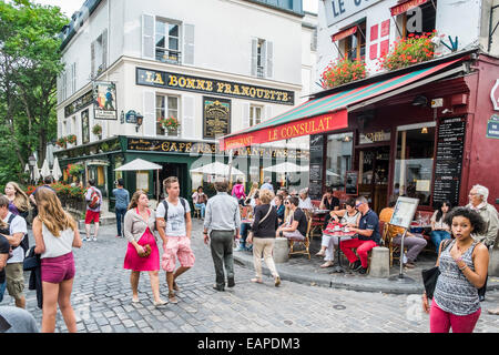 tourists at montmatrre at the corner of rue saint rustique and rue des saules, paris, ile de france, france Stock Photo