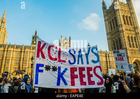 London, UK. 19th Nov, 2014. Students march through central London to demand that politicians scrap tuition fees. The demonstration was organised by the National Campaign Against Fees and Cuts (NCAFC) and the Student Assembly Against Austerity with Students travelling to London from cities around the UK, including Aberdeen, Glasgow, Newcastle, Leeds and Sheffield. They assembled at Malet Street, where part of the University of London is based, and then marched to Whitehall, and ending outside the Houses of Parliament. Credit:  Guy Bell/Alamy Live News Stock Photo