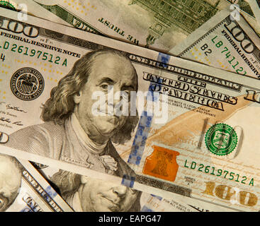 Newest US $100 bills as of 2013 with an embedded magnetic strip among other qualities difficult to forge. Stock Photo