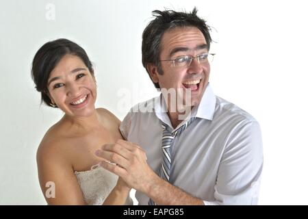 Newly wed hispanic couple dancing Stock Photo