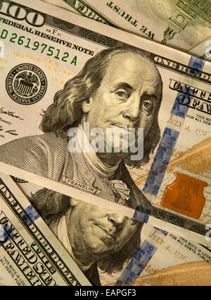Newest US $100 bills as of 2013 with an embedded magnetic strip among other qualities difficult to forge. Stock Photo