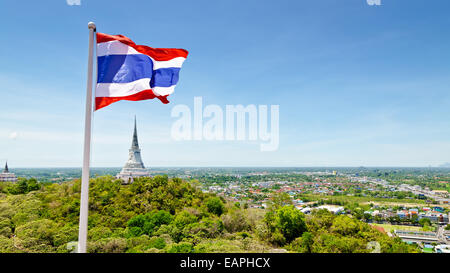 Thai flag waving on mountain in Phra Nakhon Khiri temple, archaeological site of Phetchaburi Province, Thailand Stock Photo
