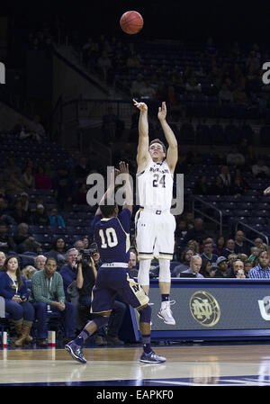 Notre Dame guard Pat Connaughton, left, drives the lane as Virginia ...