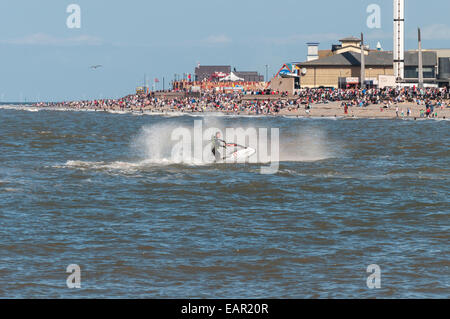 Rhyl Air Show August 31st 2014 showing sky tower and Rhyl beach with spectators and Jet skier Stock Photo