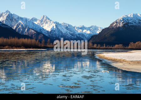 Ice floating in the Chilkat River near Haines Alaska on a sunny November day. Stock Photo