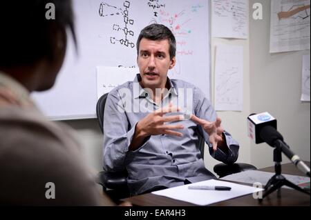 New York, USA. 17th Nov, 2014. Christopher Fabian, the co-creator of the United Nations Children's Fund (UNICEF) Innovation Unit, receives an interview by Xinhua in New York, the United States, Nov. 17, 2014. The new-edition of the State of the World's Children Report was compiled with brave thinking strategies and innovation measures, Fabian said. © Niu Xiaolei/Xinhua/Alamy Live News Stock Photo