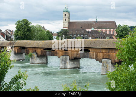 The longest covered wooden bridge in Europe, Rhine River and St. Fridolin's Minster, Bad Säckingen, Baden-Württemberg, Germany Stock Photo