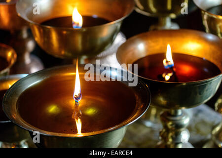 Butterlamps, in the monastery of Matho, Ladakh, Jammu and Kashmir, India Stock Photo