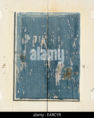 old wooden door gray cracked paint background and texture Stock Photo