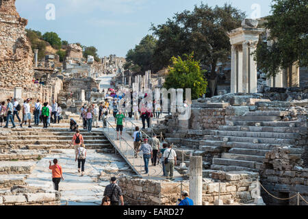 Tourist groups in Curetes Street, ancient city of Ephesus, UNESCO World Heritage Site, Selçuk, Izmir Province, Turkey Stock Photo