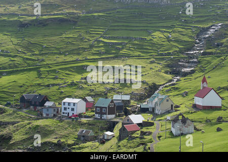 Pasture and creek, village threatened by depopulation, Hattarvík, Fugloy, Norðoyar, Faroe Islands, Denmark Stock Photo