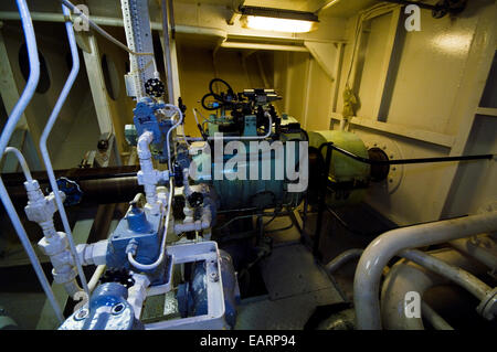 The engine room and a propeller shaft in an Antarctic ship. Stock Photo