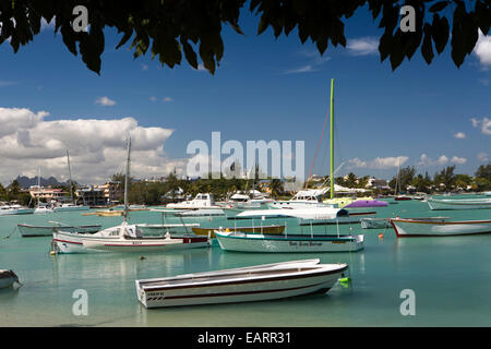 Mauritius, Grand Baie, public beach, leisure boats moored in sheltered bay Stock Photo