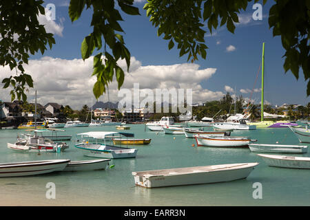 Mauritius, Grand Baie, public beach, leisure boats moored in sheltered bay Stock Photo
