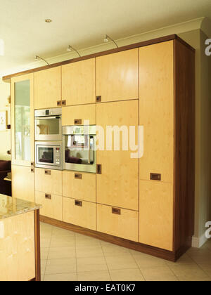 Integral oven in fitted units in contemporary kitchen Stock Photo