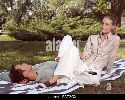 young couple in love resting in the park Stock Photo