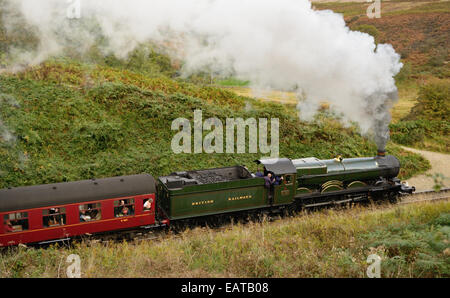 GWR loco No 5029 Nunney Castle climbing the steep gradient towards Goathland on the North Yorkshire Moors Railway. Stock Photo