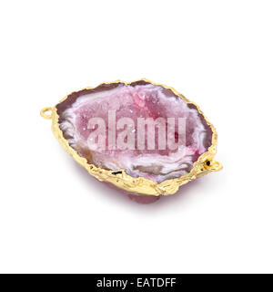 Beautiful natural pink mineral in gold frame. White background. Macro shooting. Stock Photo