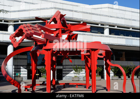 A red sculpture in front of the Pima County Public Library, Tucson AZ Stock Photo