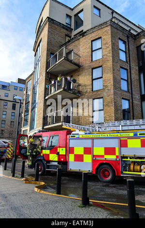 Stock Photo - Firefighters at the scene of an incident at apartment block. Photo: George Sweeney/Alamy Stock Photo