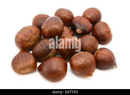 Sweet chestnuts in shells, isolated on a white background Stock Photo