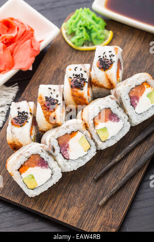 Sushi roll with salmon, tuna and eel Stock Photo