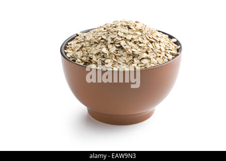 oat flakes in bowl on white background Stock Photo