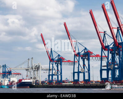Cargo cranes at the container terminal 'Burchardkai' at Hamburg harbor. Stock Photo