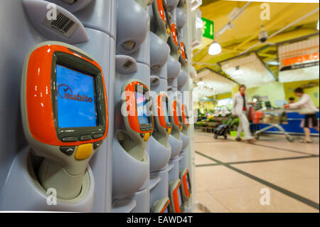 Handheld Subito self-scanning devices in a Migros supermarket in Zurich, Switzerland. Stock Photo