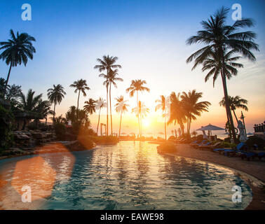 Amazing sunset on a tropical beach. Stock Photo