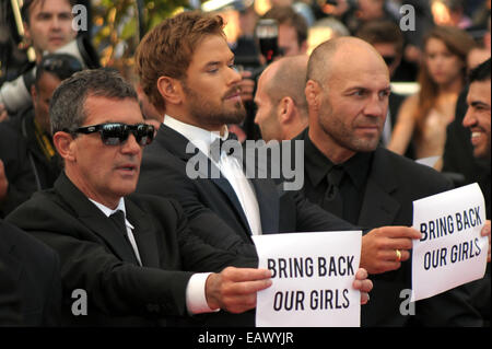 The 67th Annual Cannes Film Festival - 'The Expendables 3' premiere - Arrivals - Stars with Bring Back Our Girls signs  Featuring: Antonio Banderas,Kellan Lutz,Randy Couture Where: Cannes, France When: 18 May 2014 Stock Photo