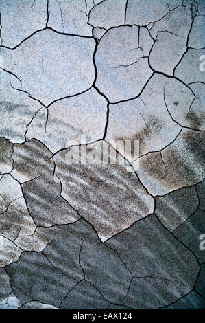 Drought and deforestation reek havoc on water levels in the Amazon River exposing sandbars and cracking the mud. Stock Photo