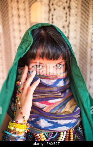 Young woman with a veiled face. Stock Photo