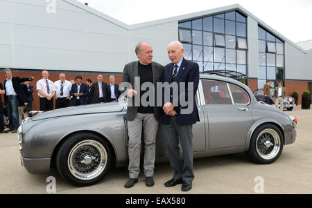 Ian Callum (Director of Design at Jaguar Cars) with the unique Jaguar Mark 2 he redesigned and John Surtees. The car has be reen Stock Photo