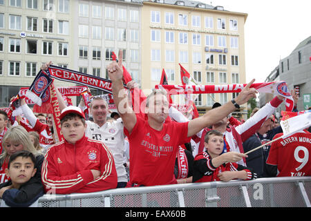 Bayern Muenchen presenting the trophy to the fans at Marienplatz after winning the DFB Cup Final match.  Featuring: Fans Where: Munich, Germany When: 18 May 2014 Stock Photo