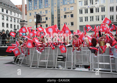 Bayern Muenchen presenting the trophy to the fans at Marienplatz after winning the DFB Cup Final match.  Featuring: Fans Where: Munich, Germany When: 18 May 2014 Stock Photo