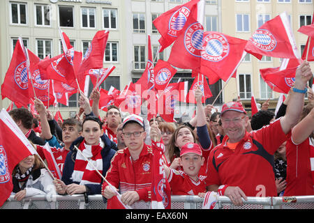 Bayern Muenchen presenting the trophy to the fans at Marienplatz after winning the DFB Cup Final match.  Featuring: Fans Where: Munich, Germany When: 18 May 2014 Stock Photo