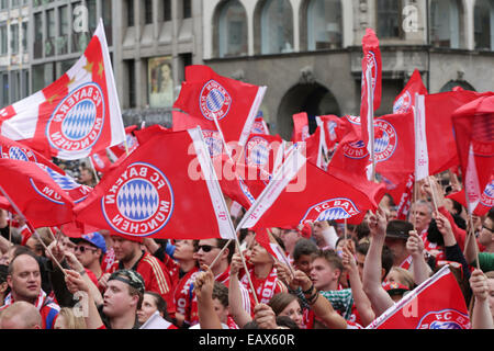 Bayern Muenchen presenting the trophy to the fans at Marienplatz after winning the DFB Cup Final match.  Featuring: Fans Where: Munich, Germany When: 18 May 2014 Stock Photo